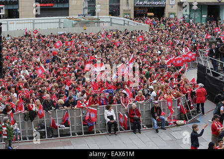 Bayern Muenchen presenting the trophy to the fans at Marienplatz after winning the DFB Cup Final match.  Featuring: Fans Where: Munich, Germany When: 18 May 2014 Stock Photo