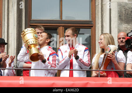 Bayern Muenchen presenting the trophy to the fans at Marienplatz after winning the DFB Cup Final match.  Featuring: Rafimha Where: Munich, Germany When: 18 May 2014 Stock Photo