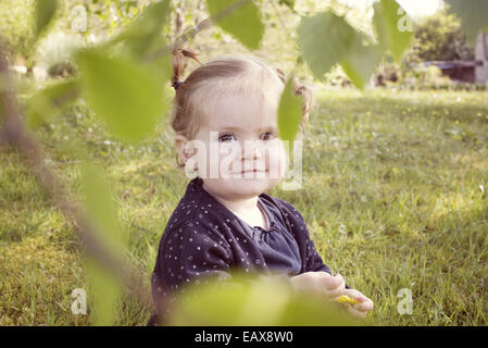 Baby girl outdoors, portrait Stock Photo