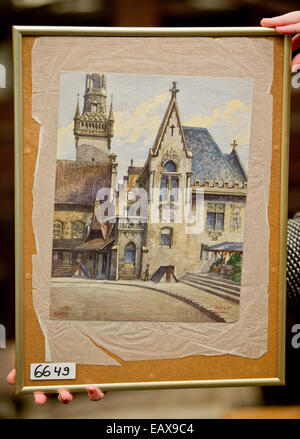 The water colour painting 'Altes Rathaus' (lit. Old Town Hall) which was supposedly painted by Adolf Hitler, is seen at an auction house in Nuremberg, Germany, 20 November 2014. The painting will be auction off by the Weidler auctioneers on 22 November 2014. The minimum price is 4500 euro. Photo: Daniel Karmann/dpa Stock Photo