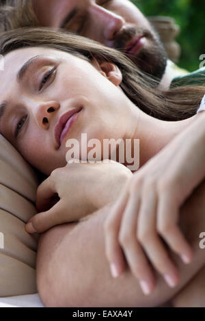Couple napping together Stock Photo