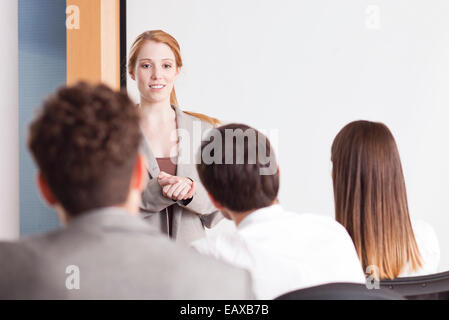 Businesswoman making presentation Stock Photo