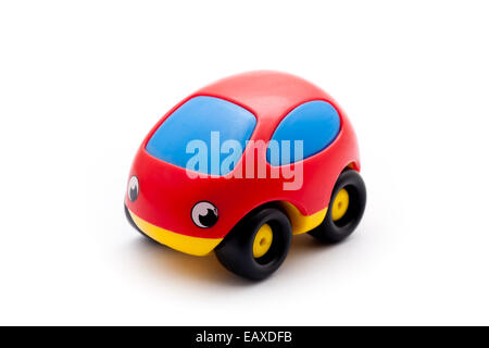 Red toy car isolated on white background. Stock Photo