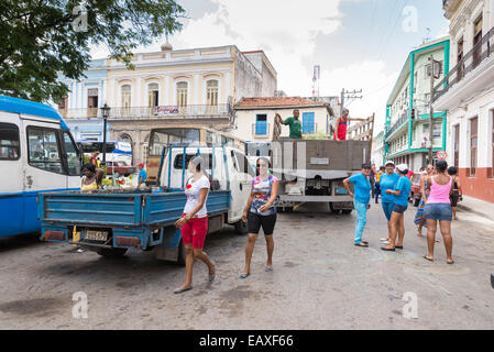 MATANZAS, CUBA - MAY 10, 2014: Lively street market of flowers and plants the day before Mother's Day. Mother's Day is celebrate Stock Photo