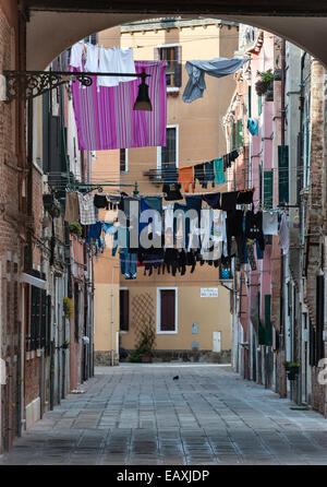 Venice, Italy. Washing hung out to dry on lines between houses Stock Photo