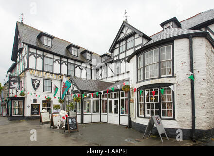 18th century White Lion Royal Hotel with ornate black and white Tudor style facade in Welsh town of Bala Stock Photo