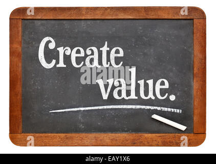 create value - advice or reminder on a vintage slate blackboard Stock Photo