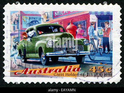 AUSTRALIA - CIRCA 1997: A stamp printed in Australia shows GMH Holden 48-125 FX 1948, circa 1997 Stock Photo