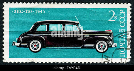 USSR - CIRCA 1976: A stamp printed in the USSR (Russia) shows old soviet car 1945 ZIS 110 , series, circa 1976. Stock Photo