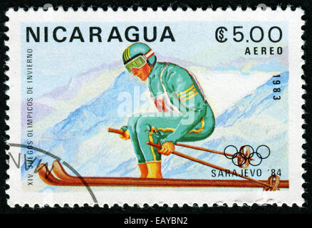 NICARAGUA - CIRCA 1983: a stamp printed in Nicaragua shows Skiing, jumping, 14th Winter Olympic Games, Sarajevo, Yugoslavia Stock Photo