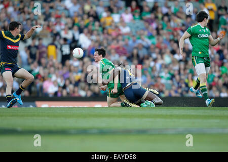 Paterson Stadium, Perth, Australia. 22nd Nov, 2014. International Rules Series Gaelic football Perth, game 1, Australia versus Ireland, Ciaran mcDonald gets caught by Nick Naitanui. Credit:  Action Plus Sports/Alamy Live News Stock Photo