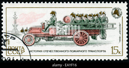 USSR - CIRCA 1984: stamp printed in USSR (Russia), shows the fire truck, LESSNER 1904, series history of the domestic transport Stock Photo