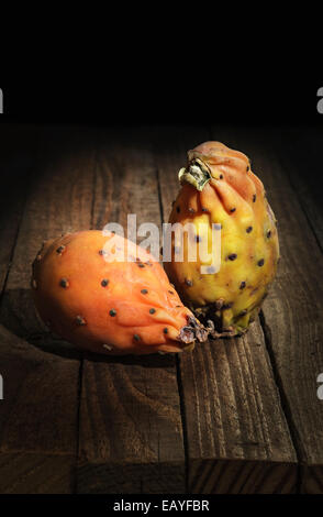 Prickly Pears on wooden background Stock Photo