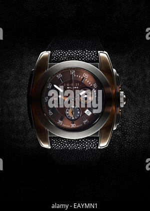 Studio still life image of a Briel chronograph watch with shagreen strap on black shagreen background. Stock Photo