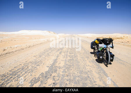 Cycling in the Sahara White desert, Egypt Stock Photo