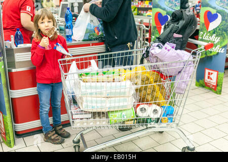 People shopping, Supermarket trolley child trolley supermarket Stock Photo