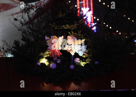 London UK -  22 November 2014. Christmas decoration seen above a stall at Hyde Parks annual Winter Wonderland event. The family friendly park at Hyde Park opened on 21 December and runs untill 4 January 2015. Photo: David Mbiyu/ Alamy Live News Stock Photo