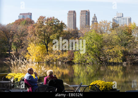 Senior Couple On Deck Outside Loeb Boathouse Restaurant in Central Park, NYC Stock Photo