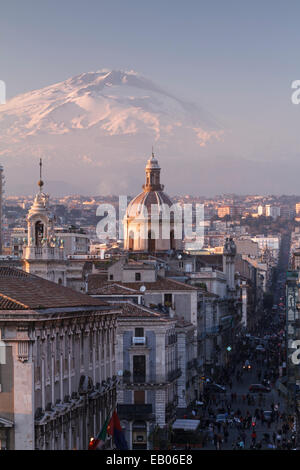 Catania, the city center with Mt. Etna volcano, covered with snow, on the background, Sicily, Italy. Stock Photo