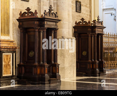 Interior of catholic church: confessional detail, 150 years old, made of wood Stock Photo