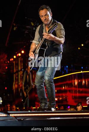 Rock superstar entertainer Bruce Springsteen plays harmonica and guitar during the Concert for Valor November 11, 2014 in Washington, D.C. Stock Photo