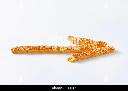 Puff-pastry strips with cheese topping Stock Photo
