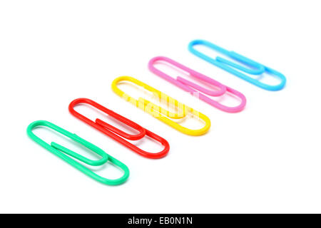 Colored paper clips on a white background closeup Stock Photo