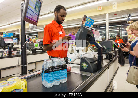 Daytona Beach Florida,Winn grocery store,supermarket,interior inside,sale,checkout line queue,Black Blacks African Africans ethnic minority,adult adul Stock Photo