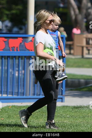 Hilary Duff and her son Luca seen leaving a park.  Featuring: Hilary Duff Where: Los Angeles, California, United States When: 21 May 2014 Stock Photo