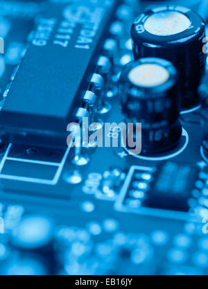 technology background (computer circuit board toned in cyan) Stock Photo