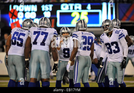 East Rutherford, New Jersey, USA. 24th Nov, 2014. Cowboys' quarterback Tony Romo (9) calls a play in the huddle in the second half during NFL action between the New York Giants and the Dallas Cowboys at the MetLife Stadium in East Rutherford, New Jersey. The Cowboys defeated the Giants 31-28. Credit:  csm/Alamy Live News Stock Photo