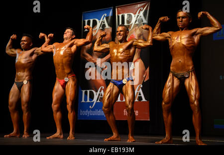 Vancouver, Canada. 23rd Nov, 2014. Male athletes compete during the 2014 International Drug Free West Coast Classic Bodybuilding competition in North Vancouver, BC, Canada, Nov. 23, 2014. International Drug Free Athletics (IDFA), founded in 2005, is committed to promoting drug free (natural) bodybuilding world wide through education, awareness, camaraderie, and community involvement. © Sergei Bachlakov/Xinhua/Alamy Live News Stock Photo