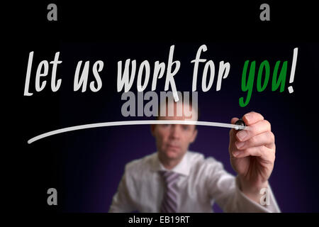 A businessman writing Let Us Work For You on a screen. Business Consultancy Concept. Stock Photo