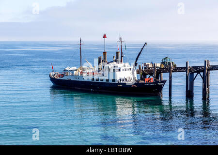 MS Oldenburg alongside the quay at Lundy unloading stores. Stock Photo