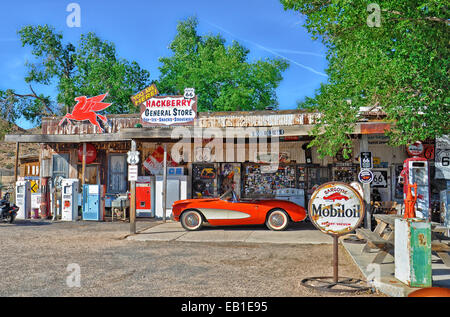 A 1957 red Corvette outside the antique Hackberry General Store on Route 66, Arizona Stock Photo