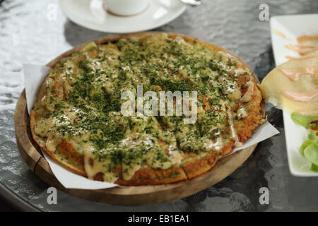 Pizza Japanese style in a cafe Stock Photo