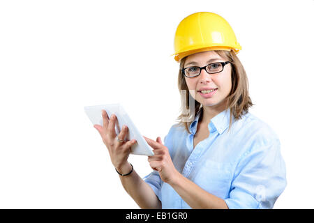 young female architect with a yellow helmet on white background Stock Photo