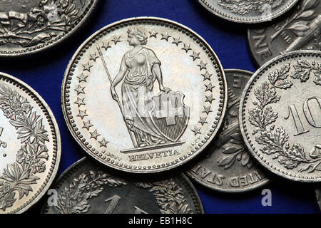 Coins of Switzerland. Standing Helvetia depicted in the Swiss one franc coins. Stock Photo