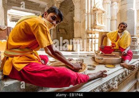 Monks Making Incense Sticks, Ranakpur Jain Temple, Rajasthan, India Stock Photo