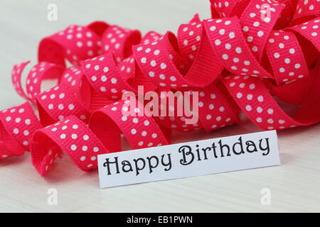 Happy birthday card with pink ribbon Stock Photo