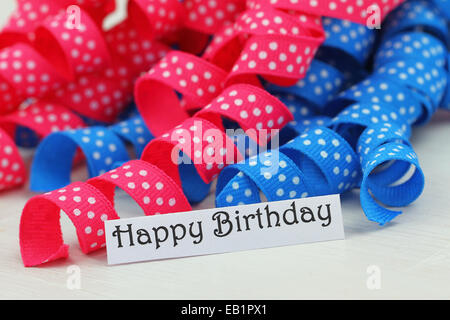 Happy birthday card with pink and blue ribbon Stock Photo