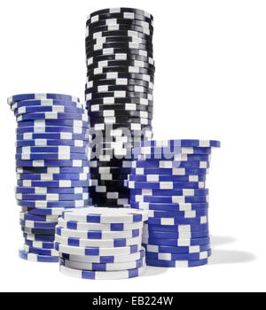 black white and blue stacks of poker chips Stock Photo