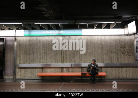 Man waiting for the train to arrive in an underground station Stock Photo