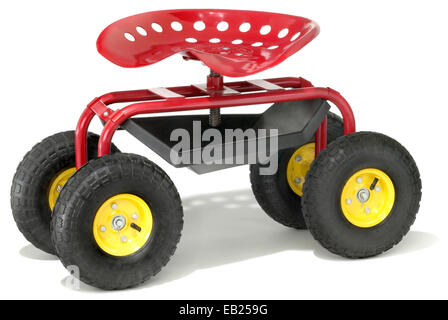 garden seat with red metal seat and tire wheels Stock Photo