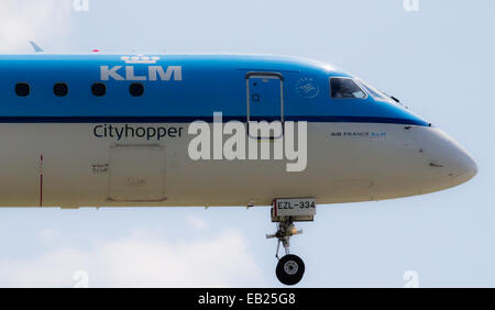 KLM Cityhopper Embraer 190ER, landing to Manchester International Airport. Stock Photo