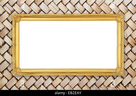 blank golden frame on bamboo texture background Stock Photo