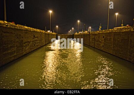 The Panama Canal, with its 48-mile ship canal in Panama,  connects the Atlantic Ocean to the Pacific Ocean. Stock Photo