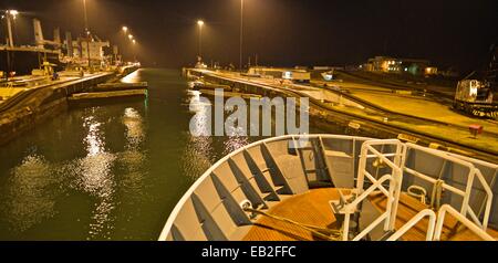 The Panama Canal, with its 48-mile ship canal in Panama,  connects the Atlantic Ocean to the Pacific Ocean. Stock Photo