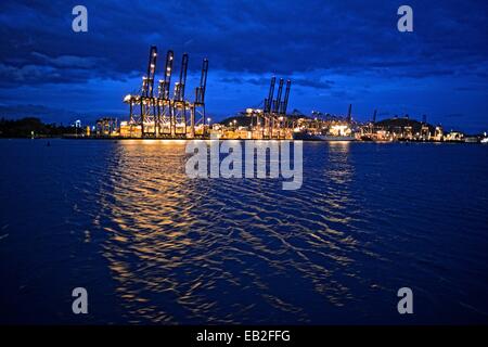 Panama Ports. The Panama Canal, with its 48-mile ship canal in Panama, connects the Atlantic Ocean to the Pacific Ocean. Stock Photo