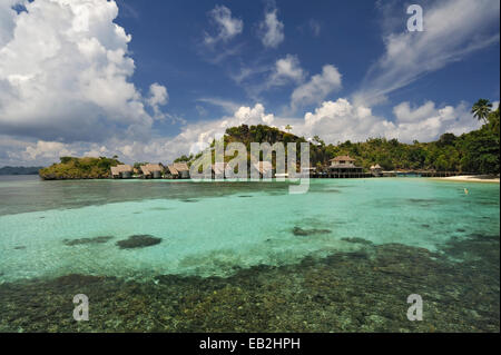 Water bungalows, Batbitim Island, Raja-Ampat, West Papua, Indonesia Stock Photo